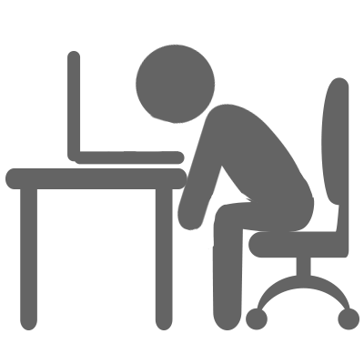 Grey stick figure hunched over a laptop at a desk.